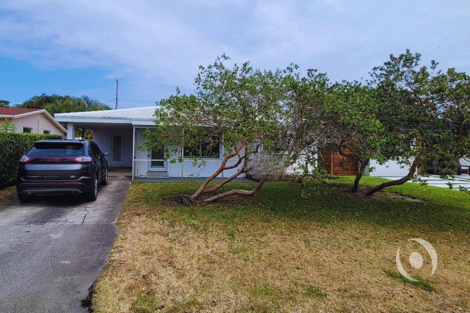 A residential renovation transforming a carport into accessible living space with improved layout, functionality, and buildable design