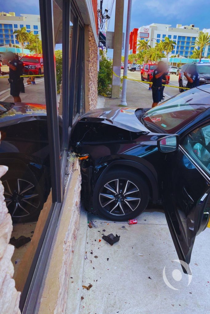 Vehicle crash into the exterior of a commercial building on North Ocean Drive in Hollywood, Florida, triggering an emergency structural engineering assessment and full concrete restoration project by NOHMIS engineer of record