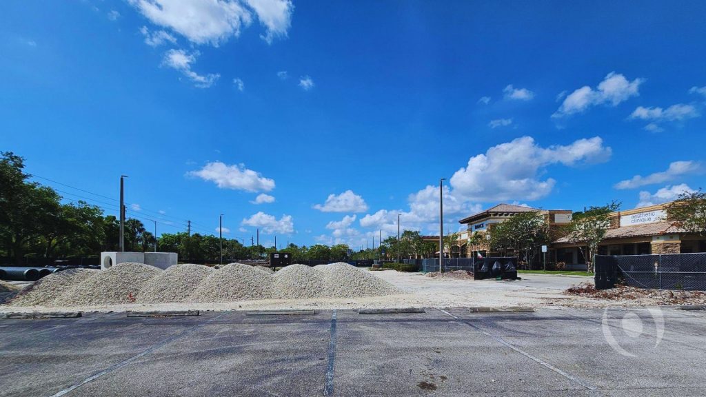 NOHMIS engineering team overseeing site preparation and grading for the new commercial building addition at Riverstone Shoppes in Parkland, Florida