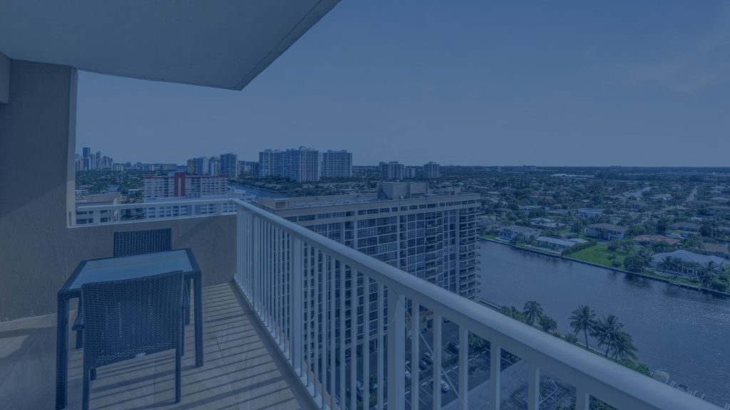 Hemispheres condo balcony in Hallandale Beach overlooking the Intracoastal Waterway and waterfront homes